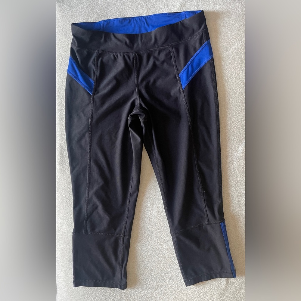 Athletic capris. Black with electric blue detailing.